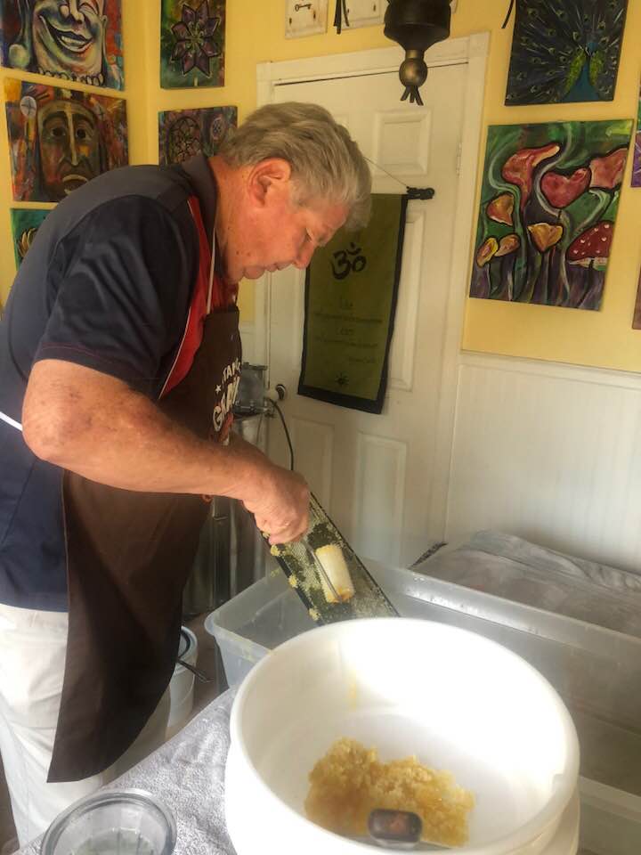 Dad extracting honey