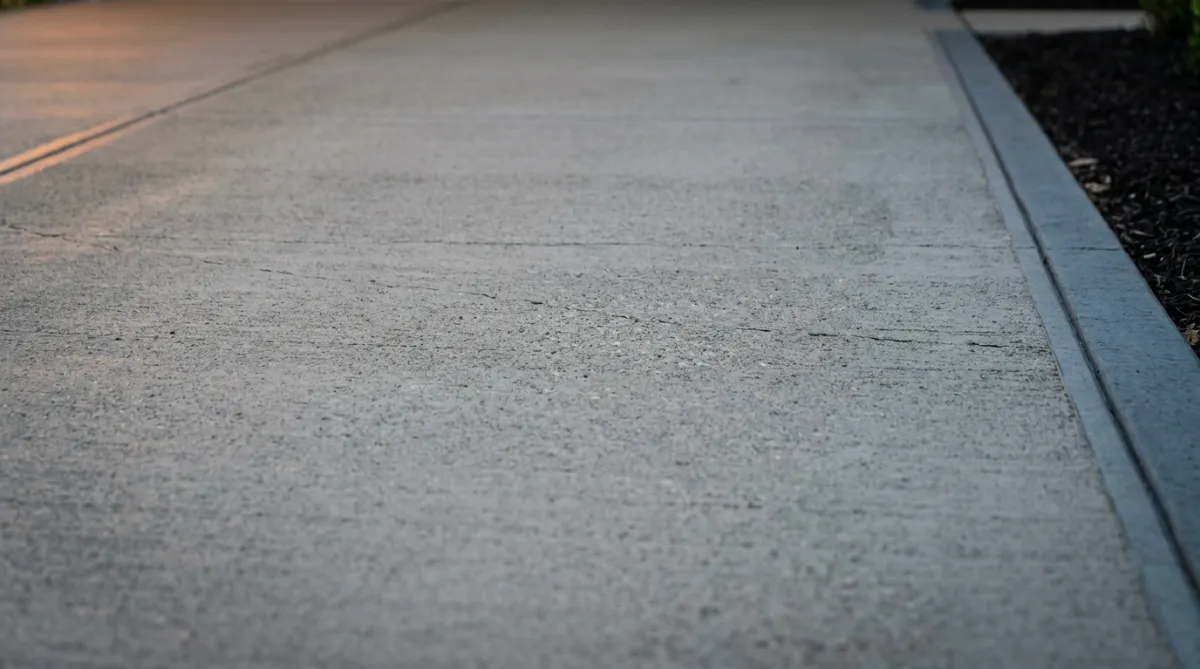 Durable concrete flatwork driveway with clean edges and smooth finish