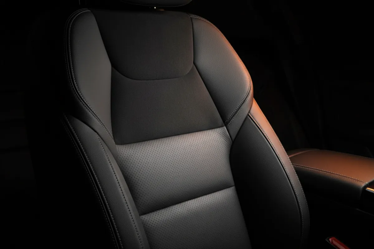 Close-up of a cleaned car seat or dashboard