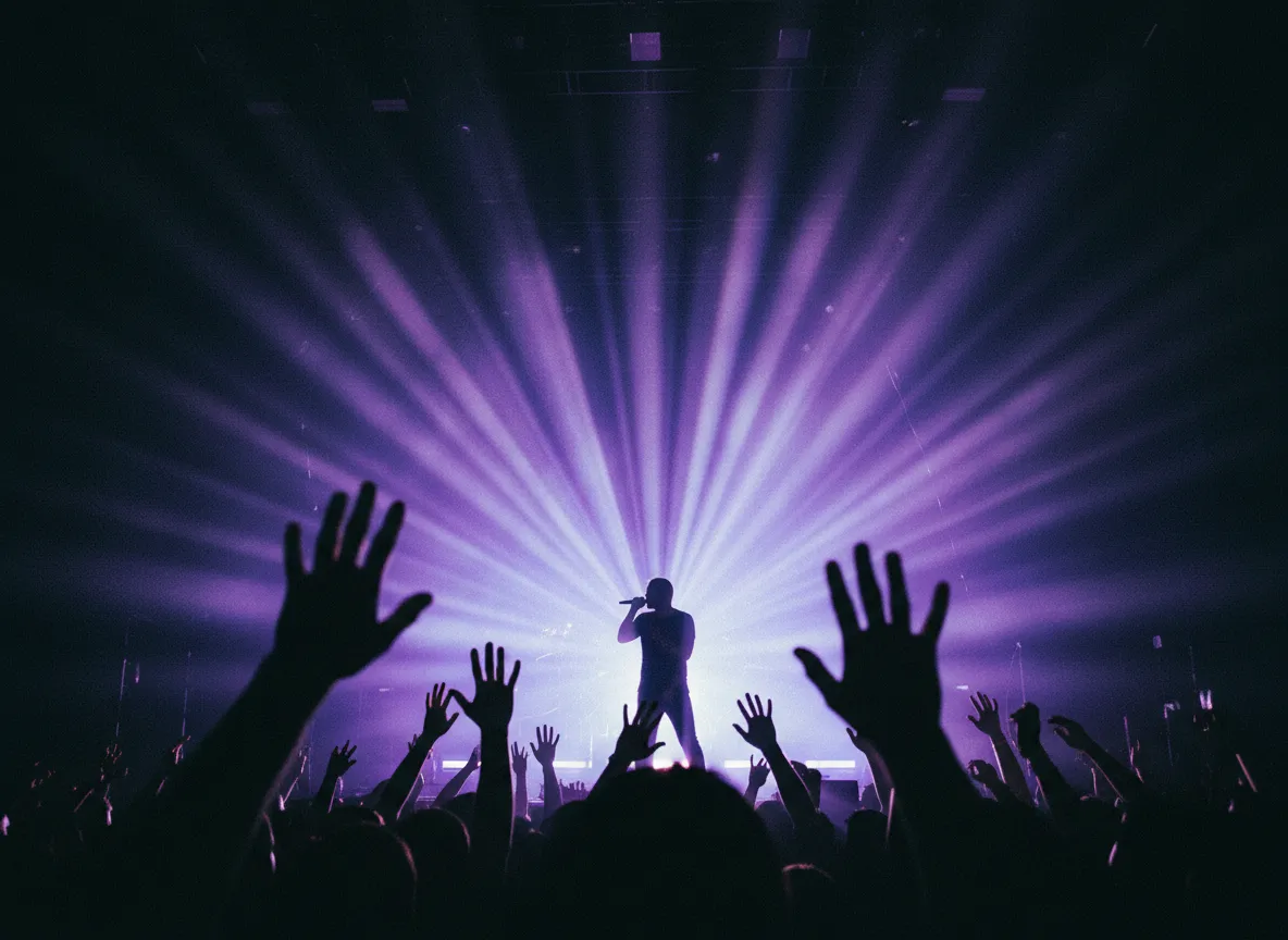 Live concert photograph with dramatic lighting