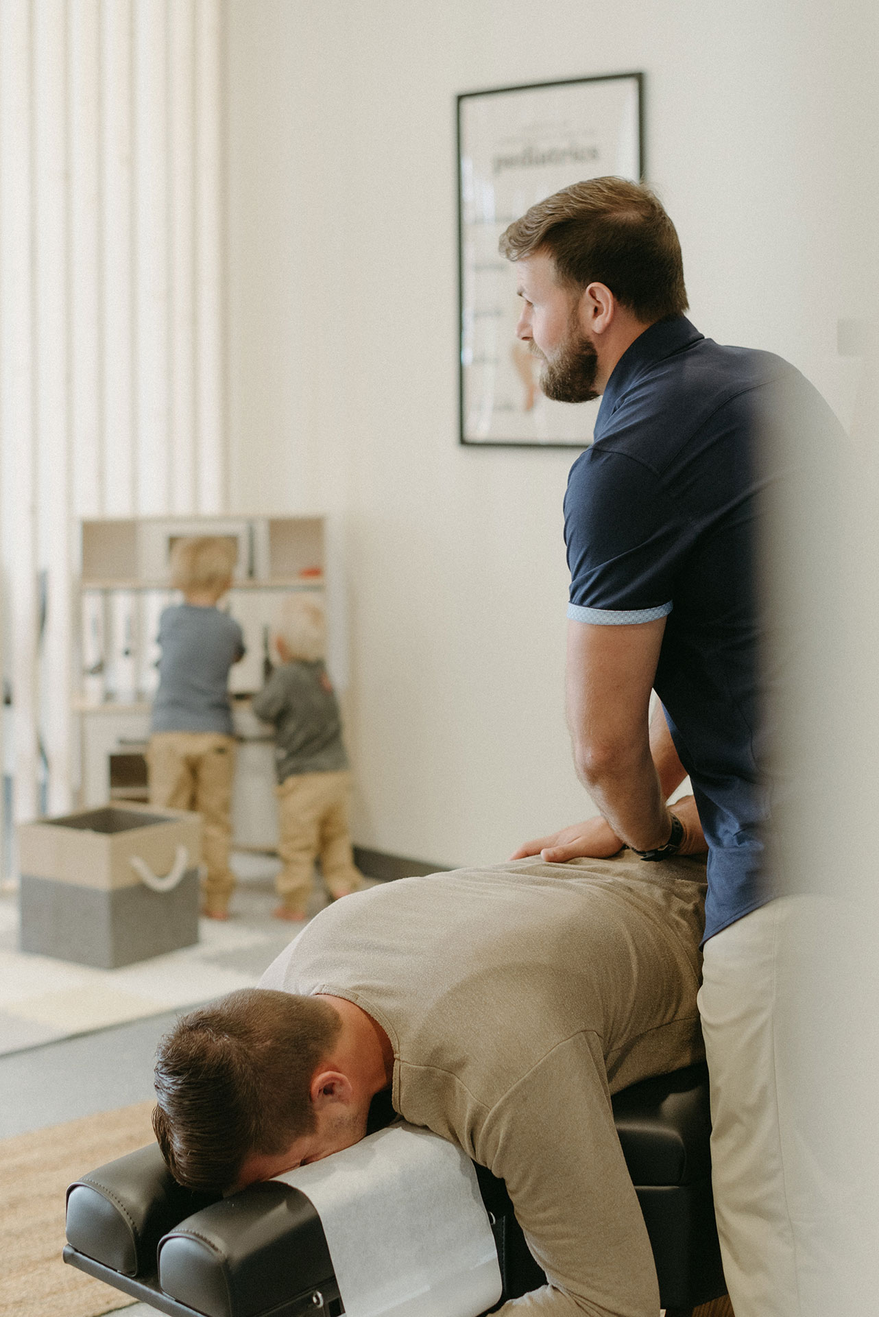 Dr. Sparks performing a chiropractic adjustment