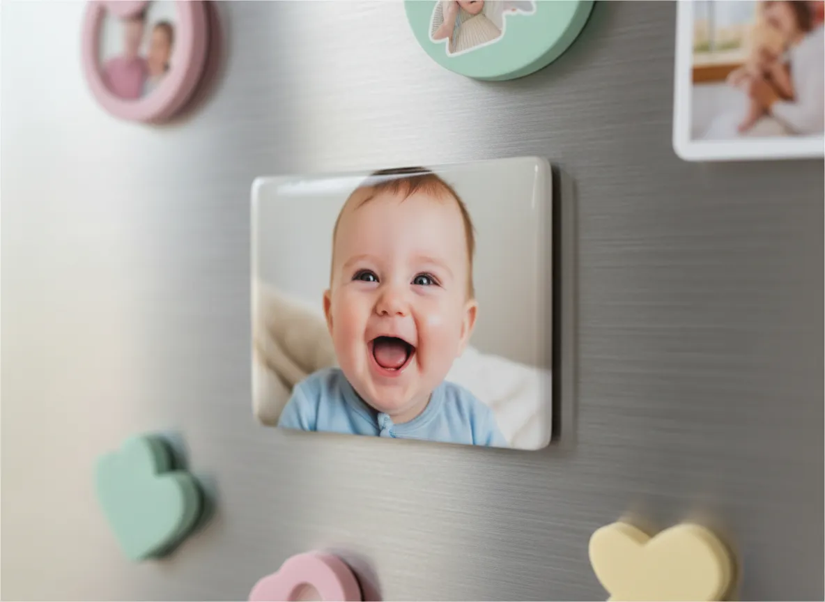 Photo magnet of a baby on a refrigerator
