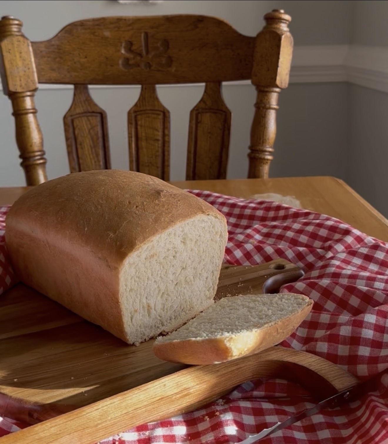 Cozy kitchen table with fresh bread