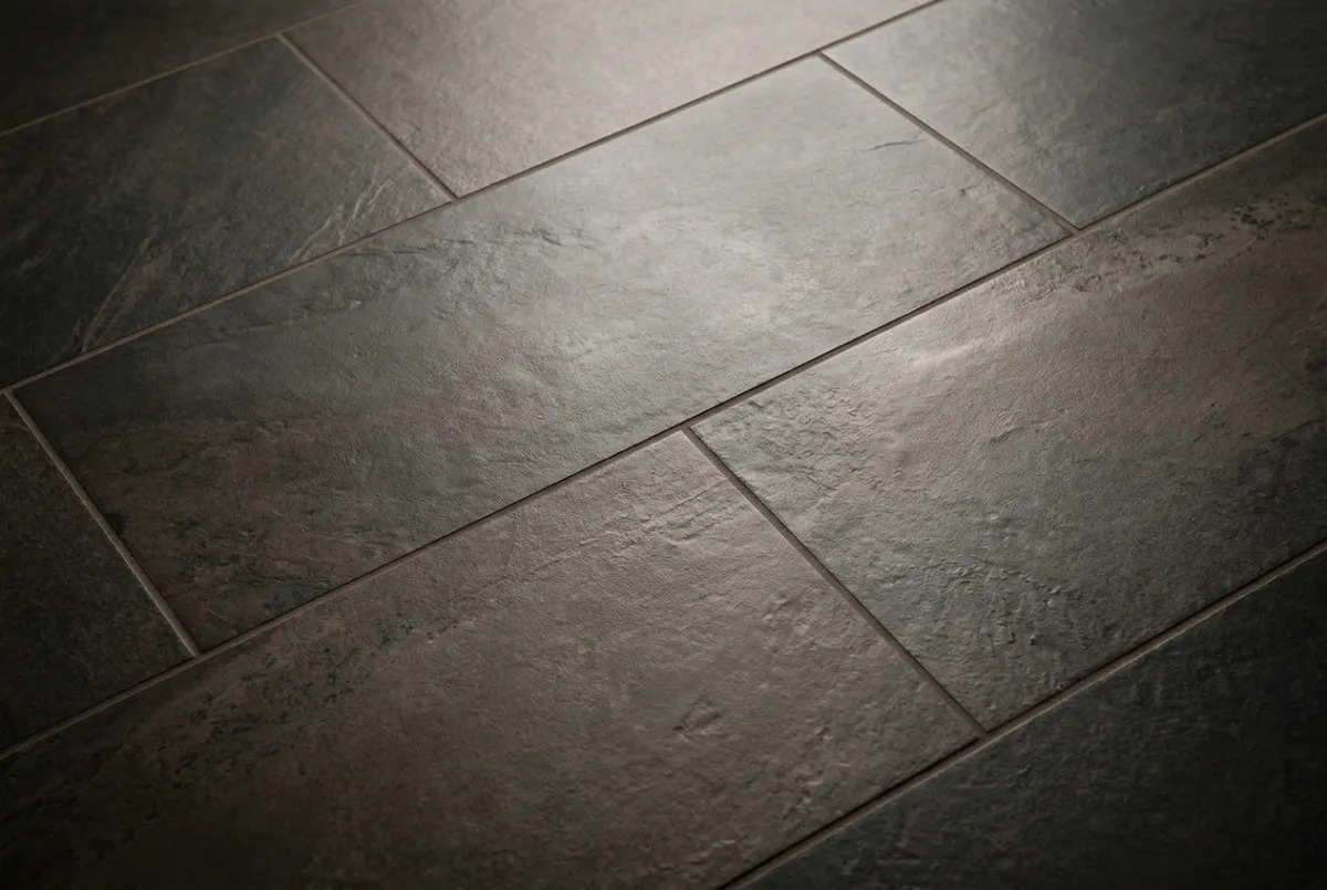 Large format ceramic and stone tile installation in luxury interior