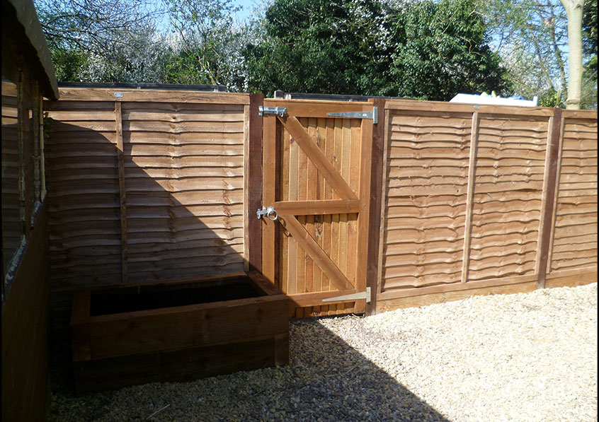 Deck and fence in Richmond Hill Wood Rock Creation