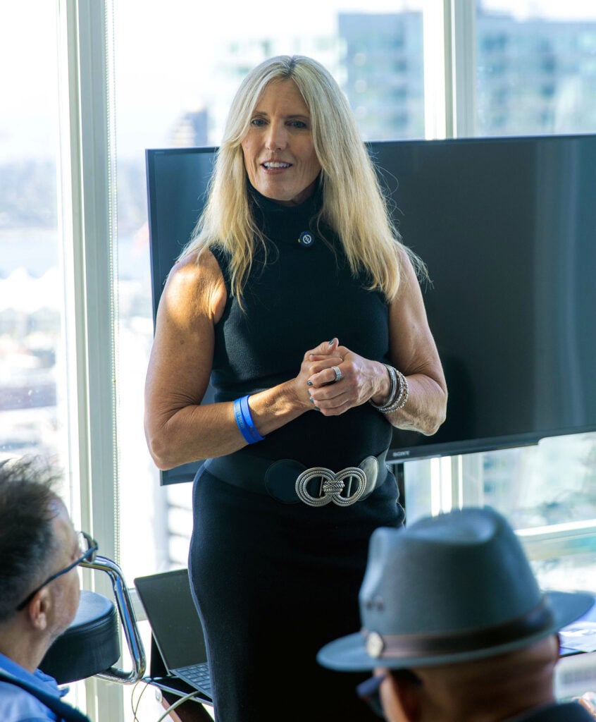 Beth Robins speaking to an audience