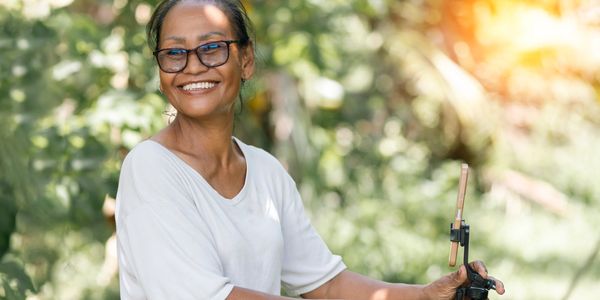 Woman smiling outdoors