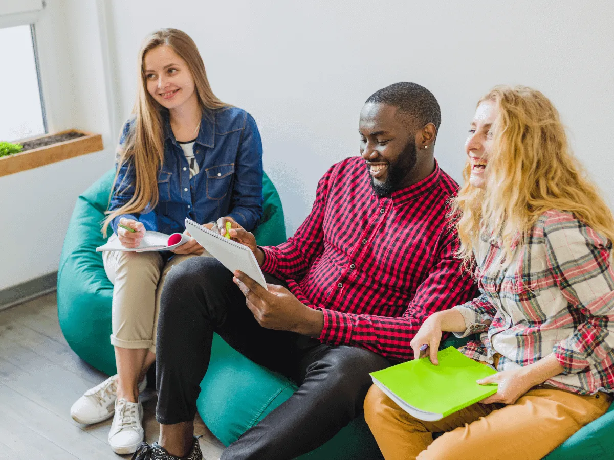Happy people talking in a support group