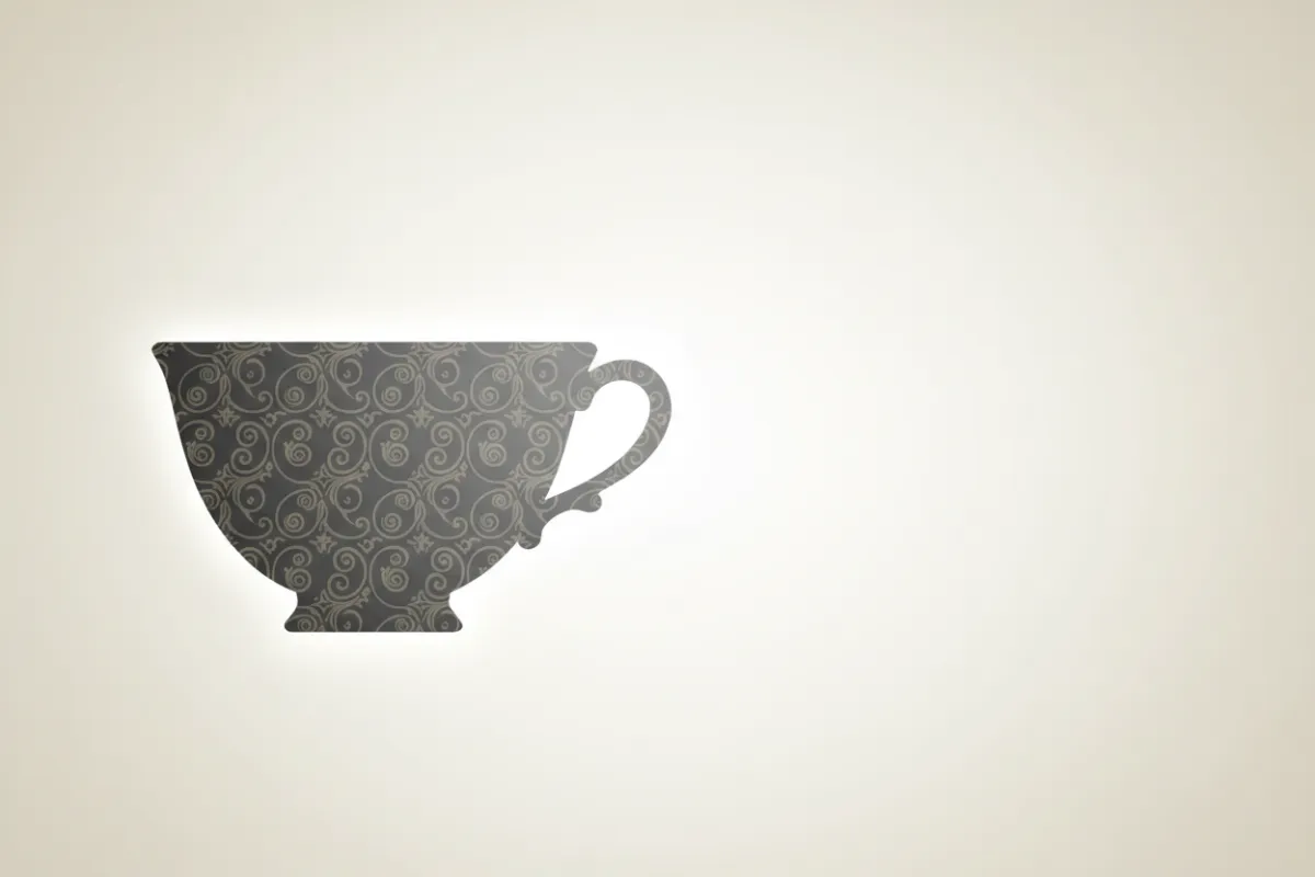 Ornate teacup decorative accent