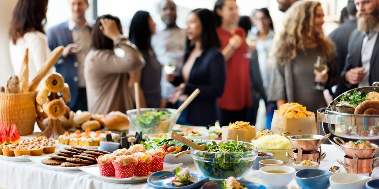Catering spread with assorted food options