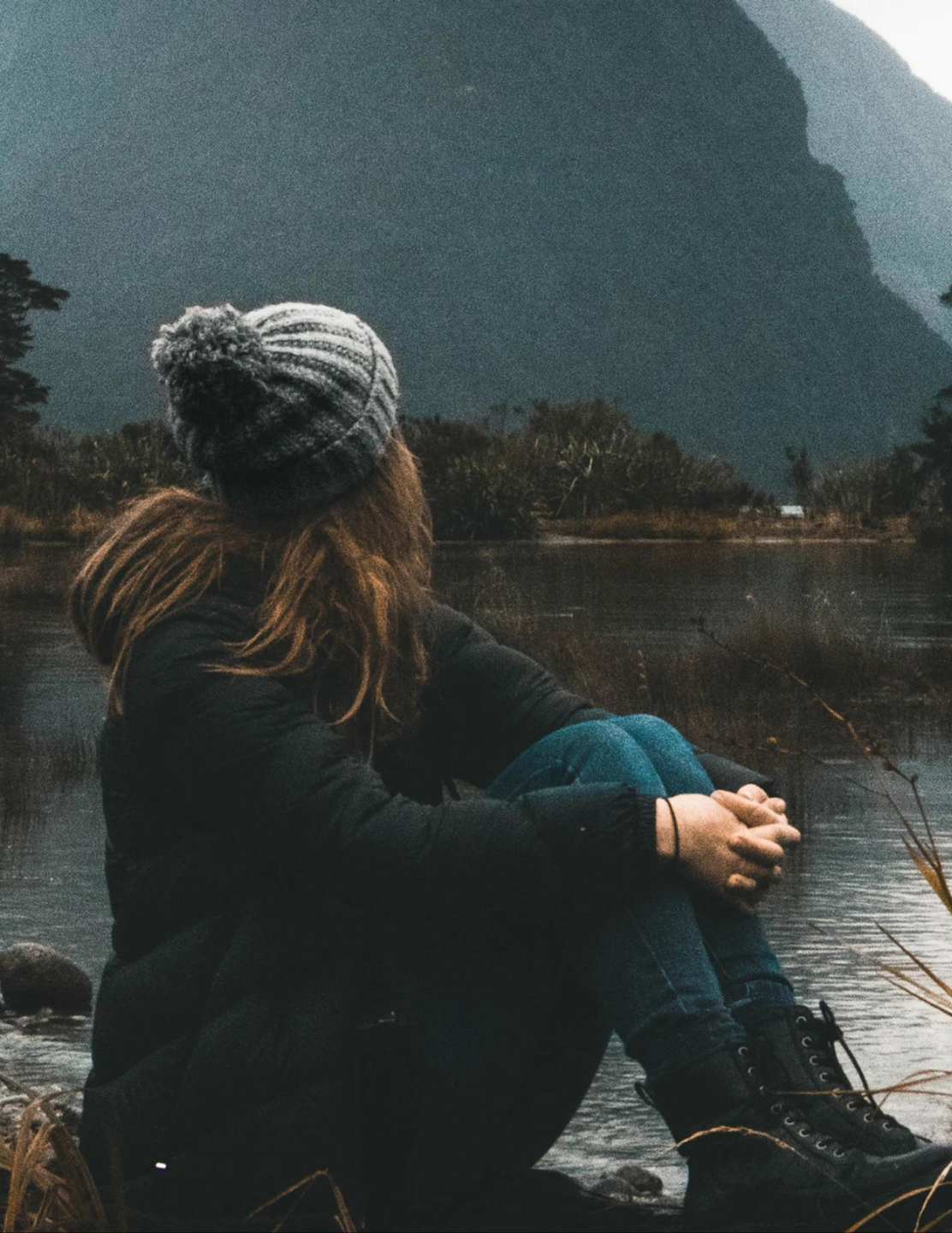contemplating woman, representing internal healing you can move towards with IFS and EMDR at Grace and Gratitude Counseling in Downers Grove, IL