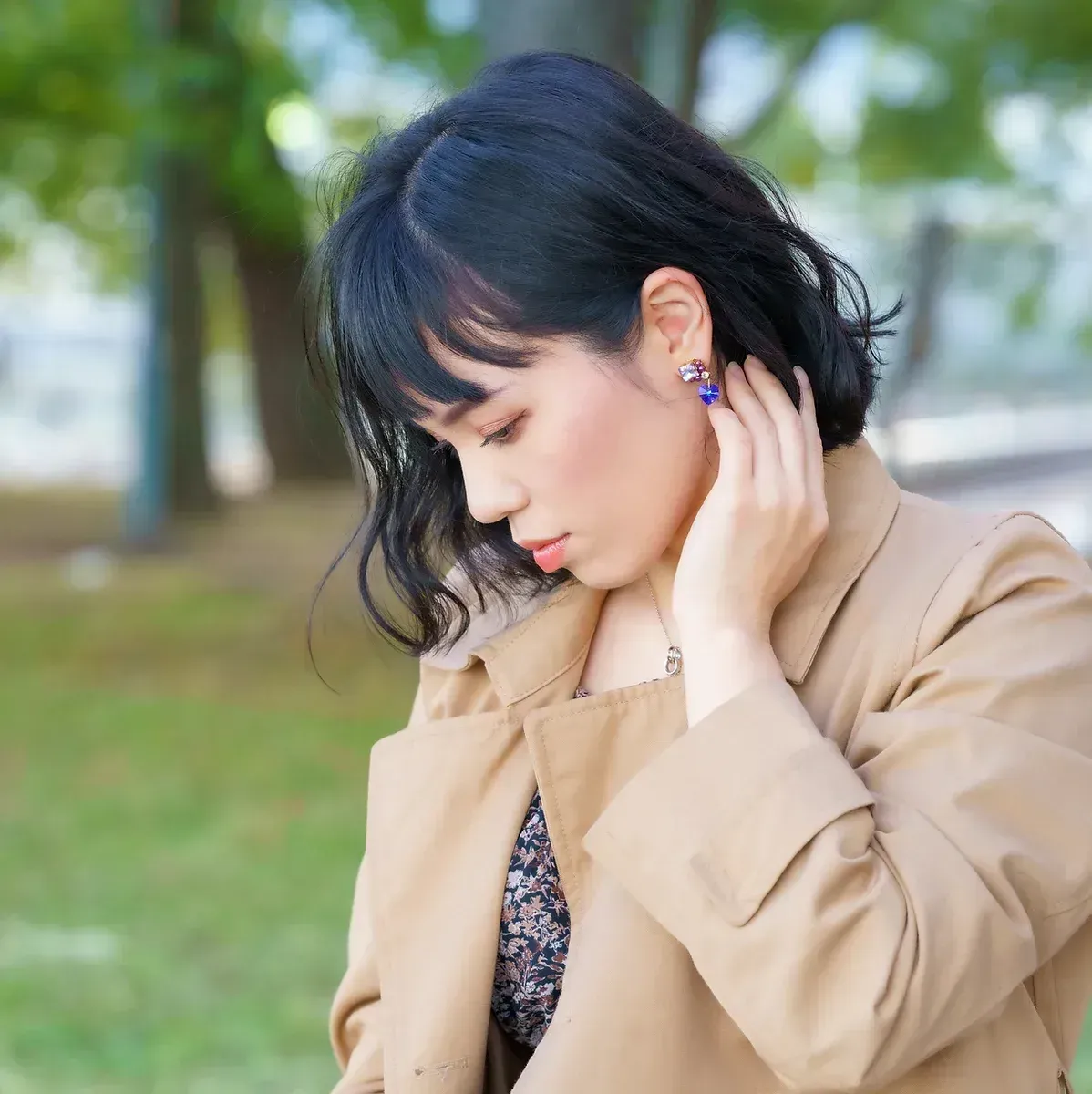 stock photo of a woman deep in thought, self critical, representing women who are struggling with perfectionism