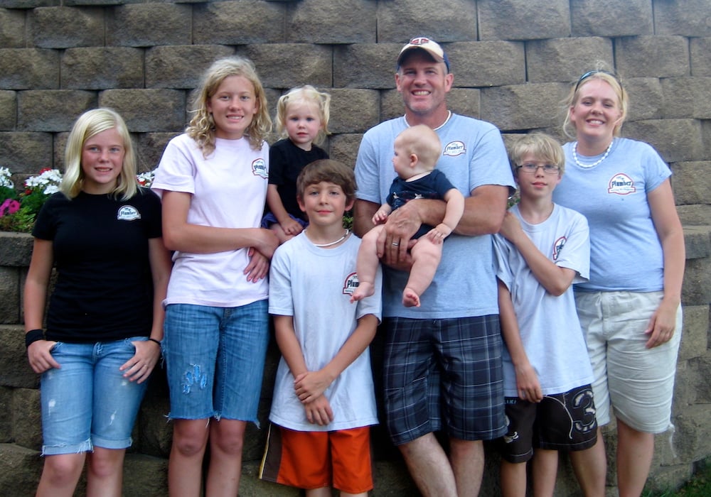 Family in matching blue shirts