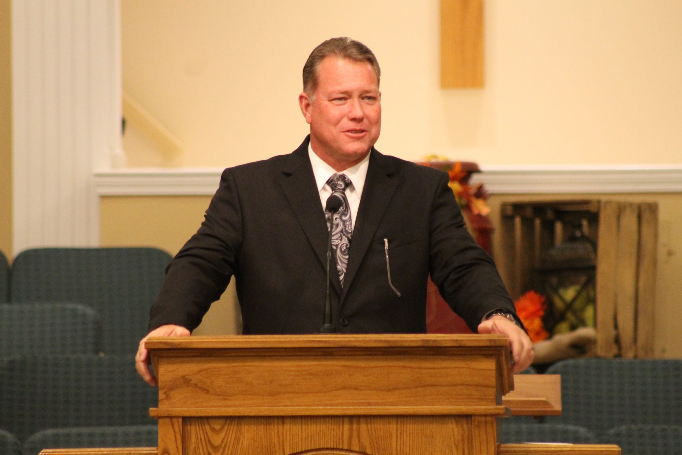 Pastor Williamson speaking at the pulpit