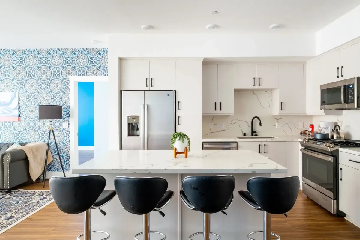 Modern white kitchen with marble countertop