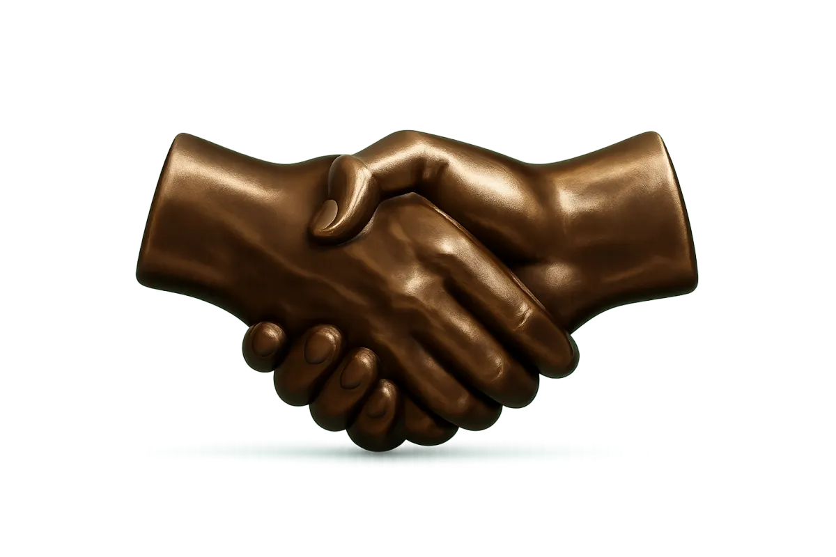 Polished bronze handshake sculpture representing strategic partnership and mutual growth