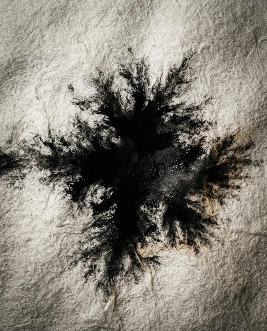 Stark high-contrast monochrome photograph of black ink diffusing through thick paper fibers casting psychological shadow gradients