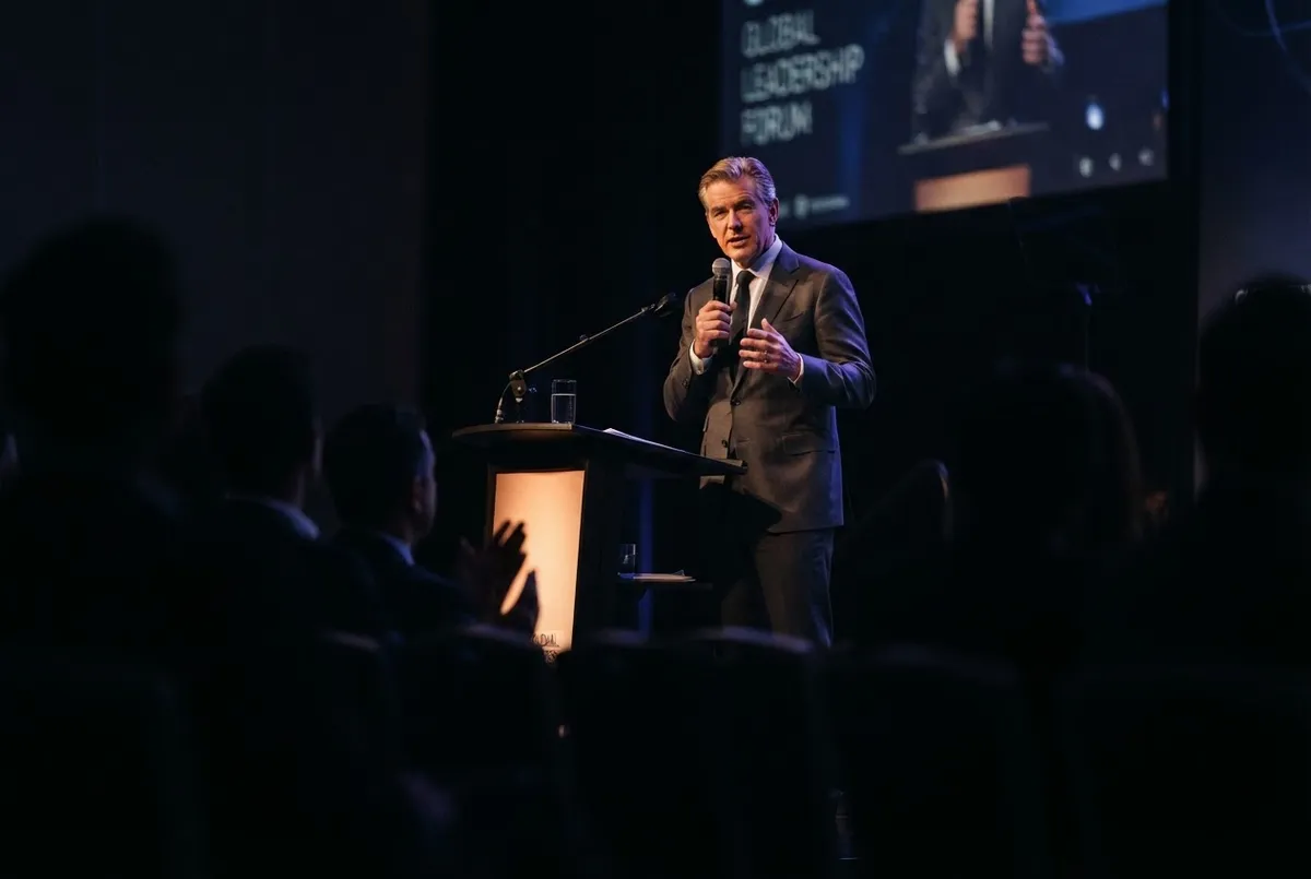 Members engaging in high-level conversation at closed-door annual summit