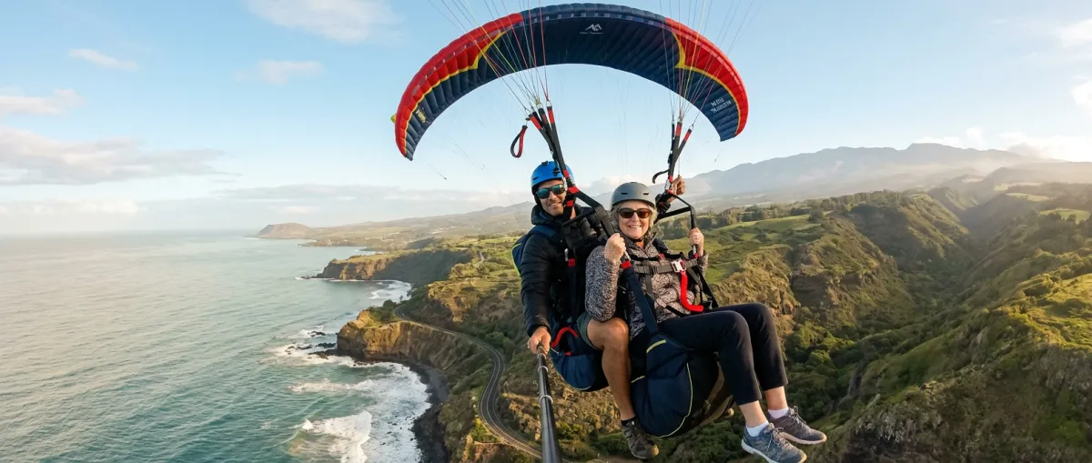 Paraglider soaring gracefully over Upcountry Maui coastline