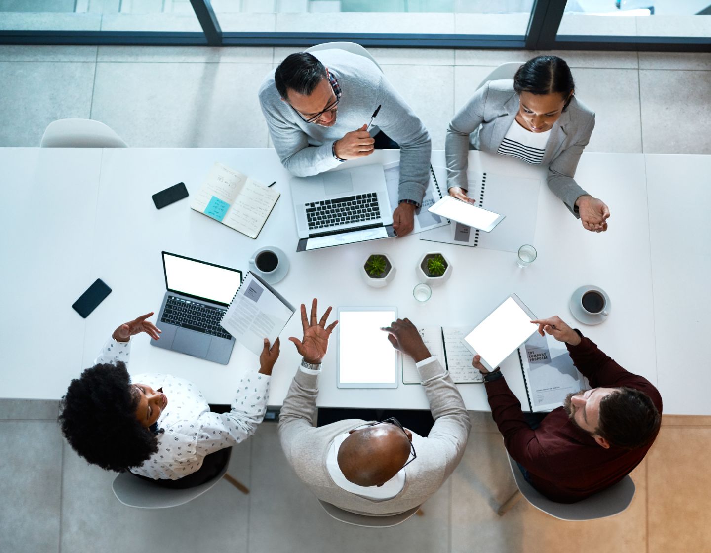 IT consulting professionals working around a table