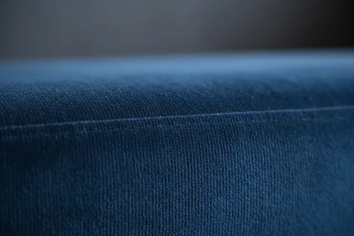 Close-up of freshly cleaned upholstery fabric showing restored texture and color.