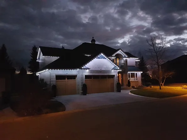 Trimlight installed on a house showing bright exterior lighting