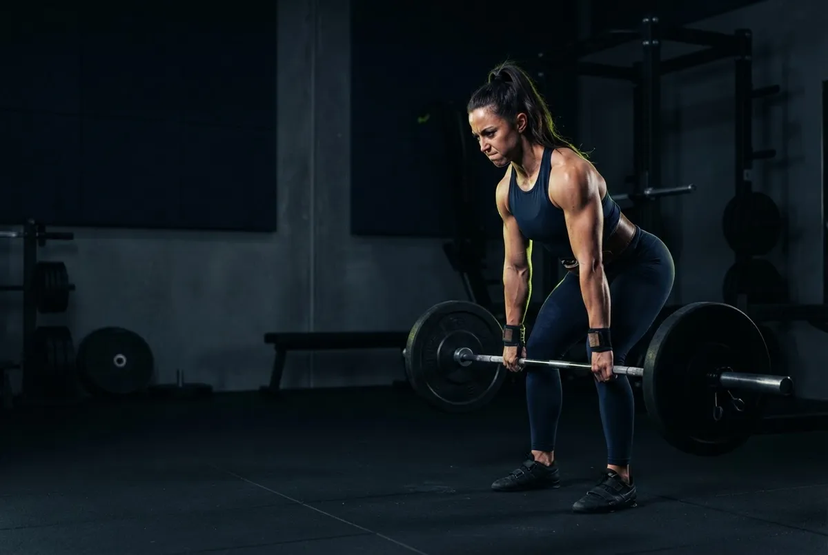 DRAFT PLACEHOLDER: Athlete training with weights in clean gym environment - temporary visualization