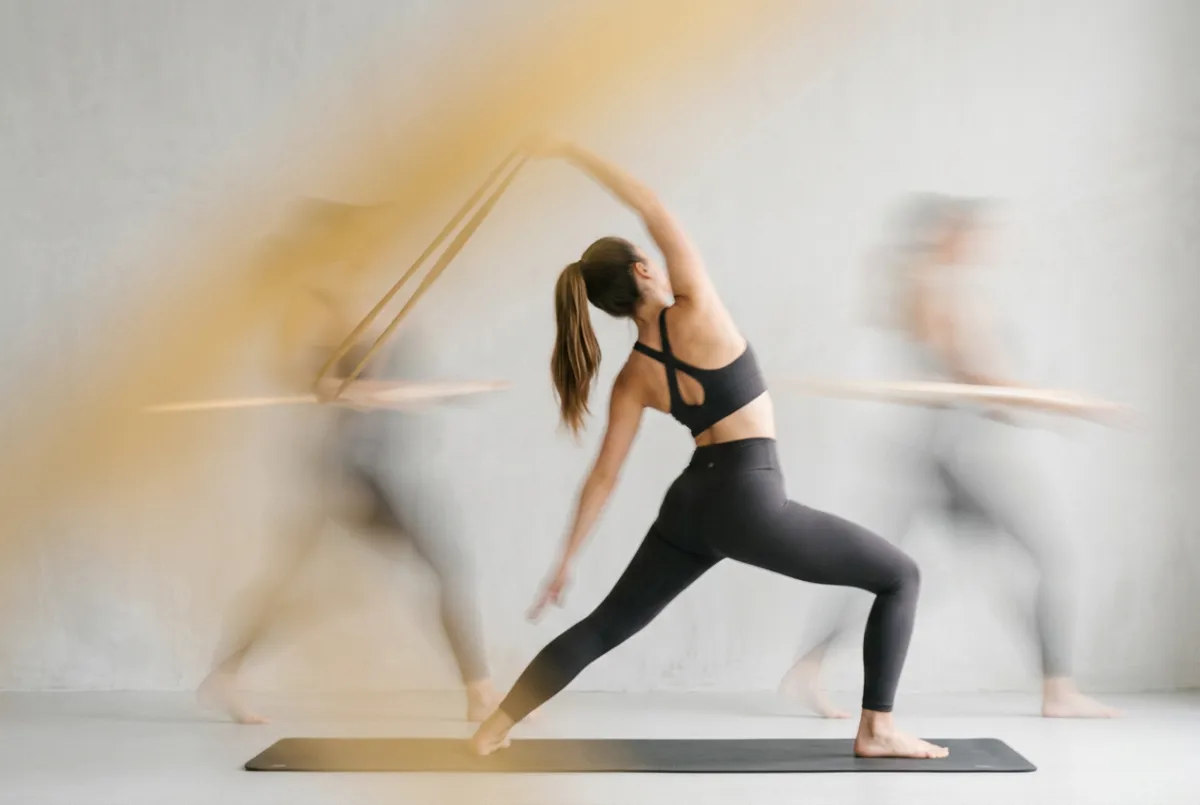 Group fitness boutique studio class showing high member engagement