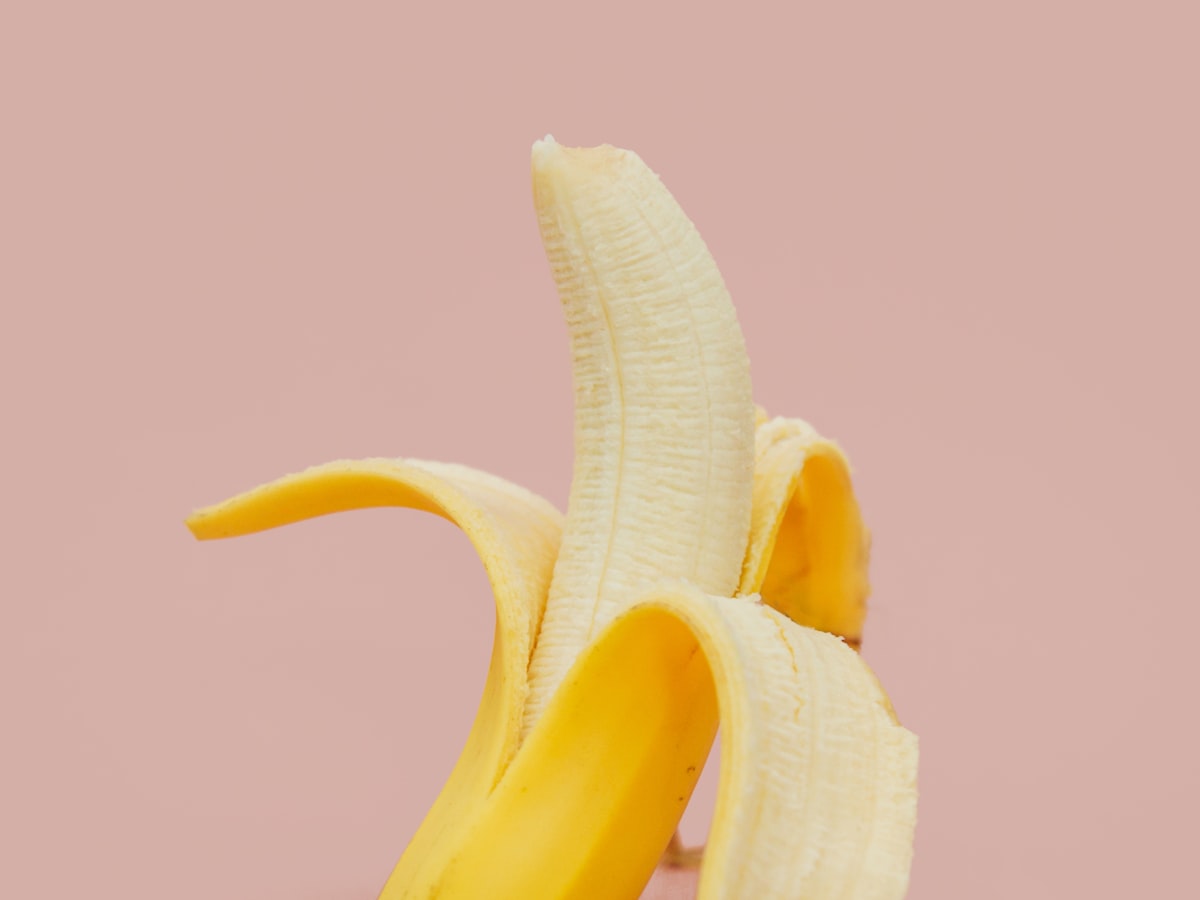 Home baker working with hands busy preparing a cake