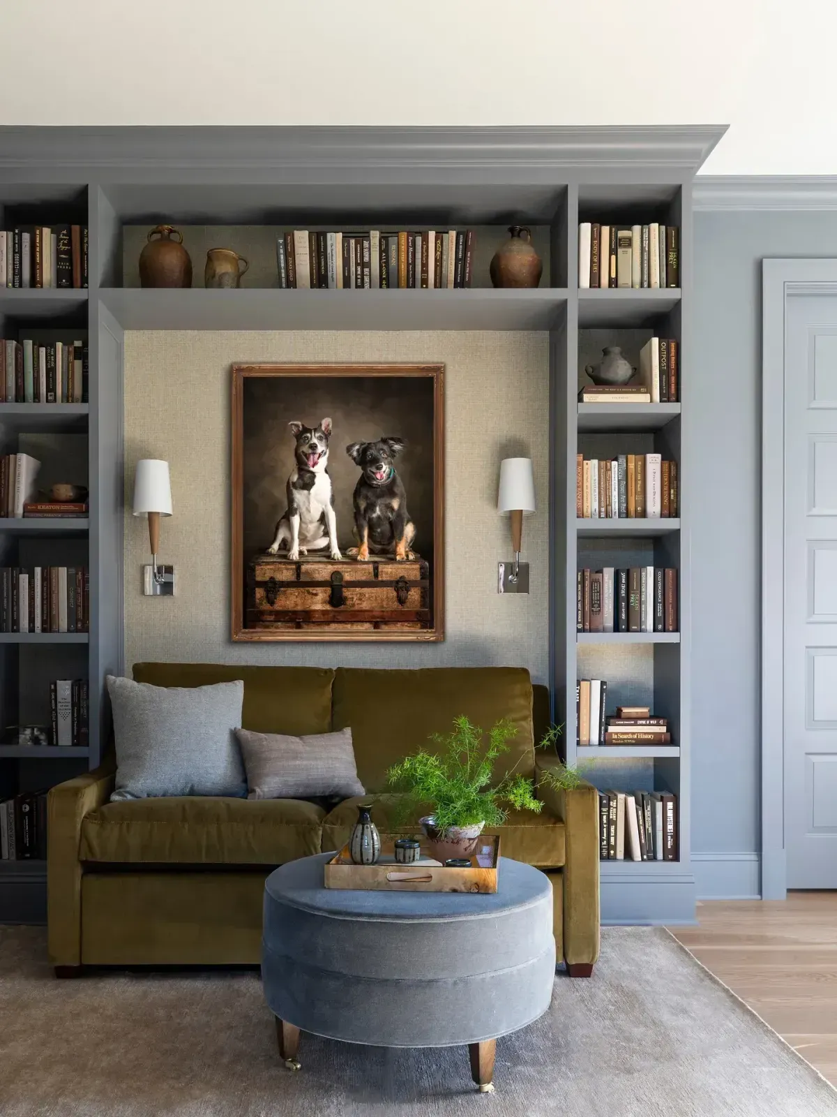 Interior room with framed dog portrait art