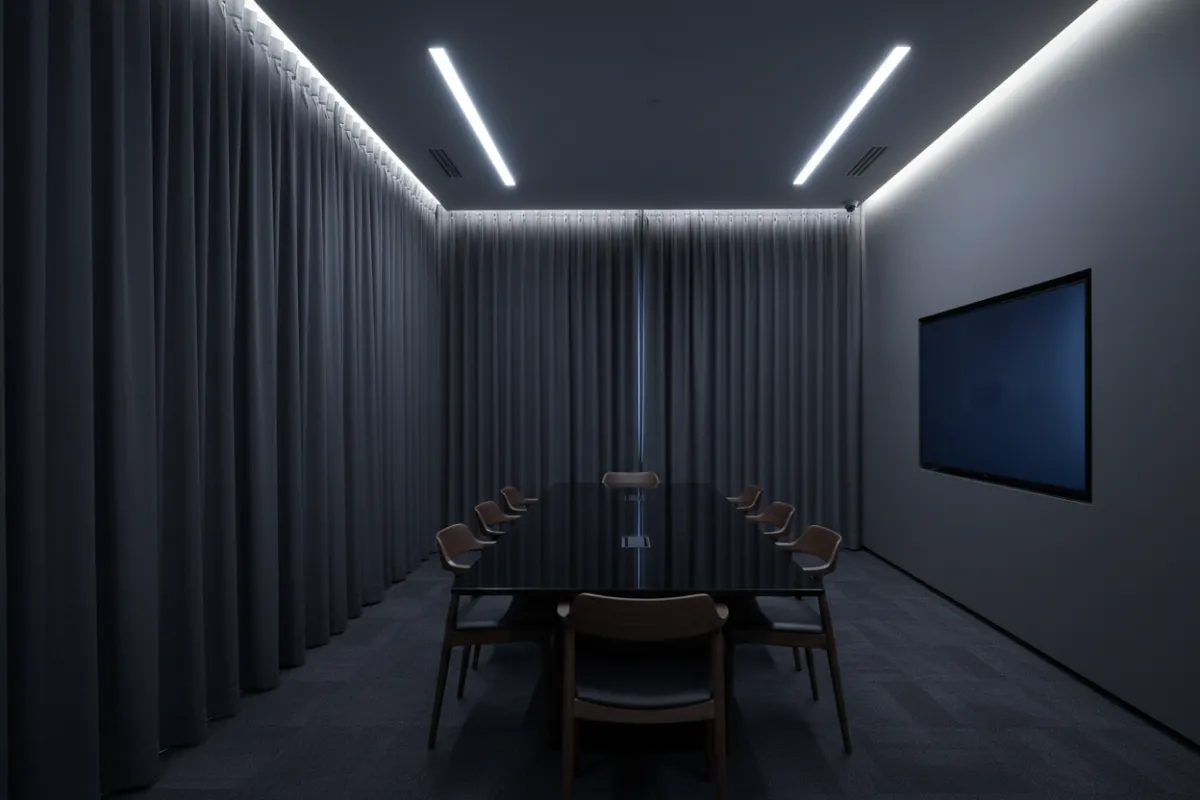 Conference room with blackout curtains demonstrating full light control
