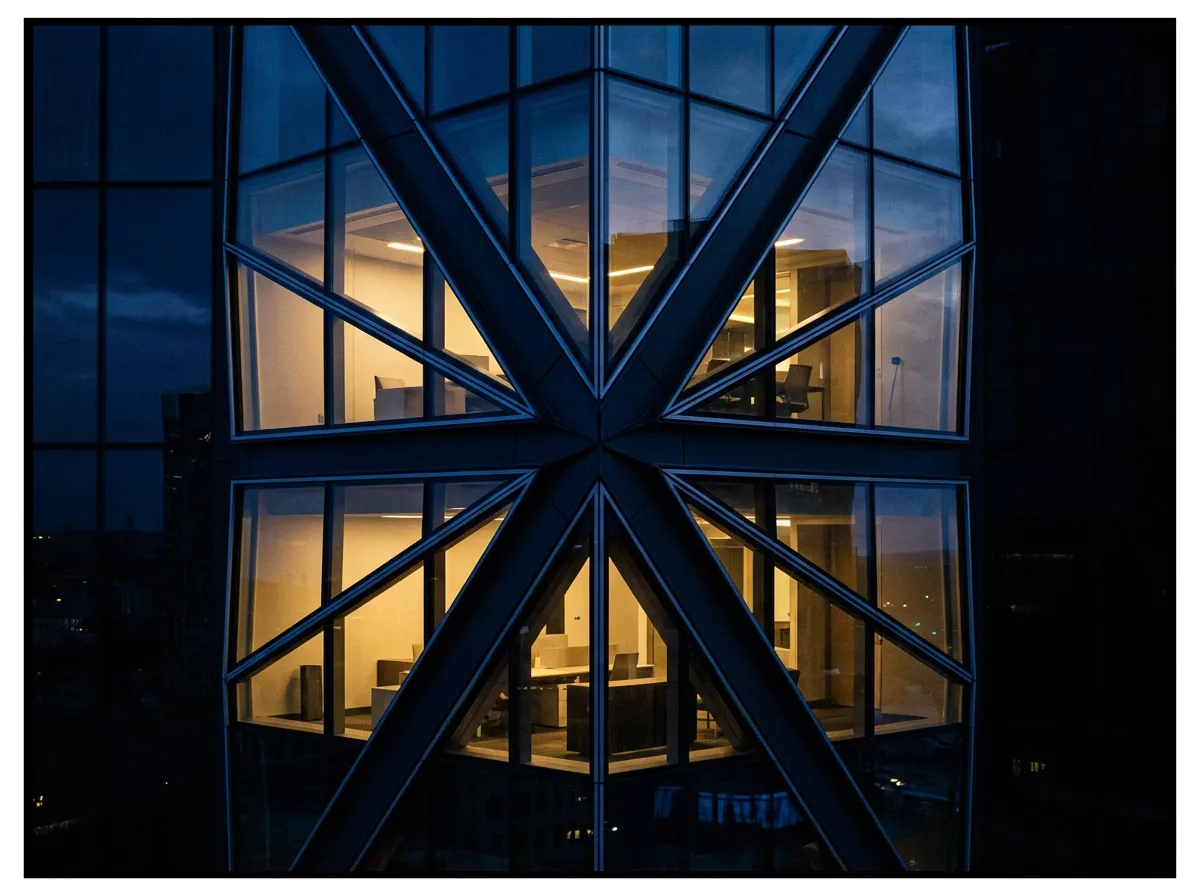 Modern high-contrast architectural glass visual illustrating strategic asset acquisition and real estate expansion