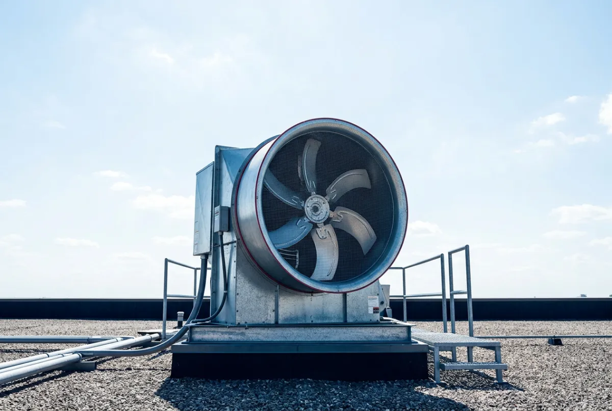 Rooftop upblast exhaust fan maintenance and shroud degreasing
