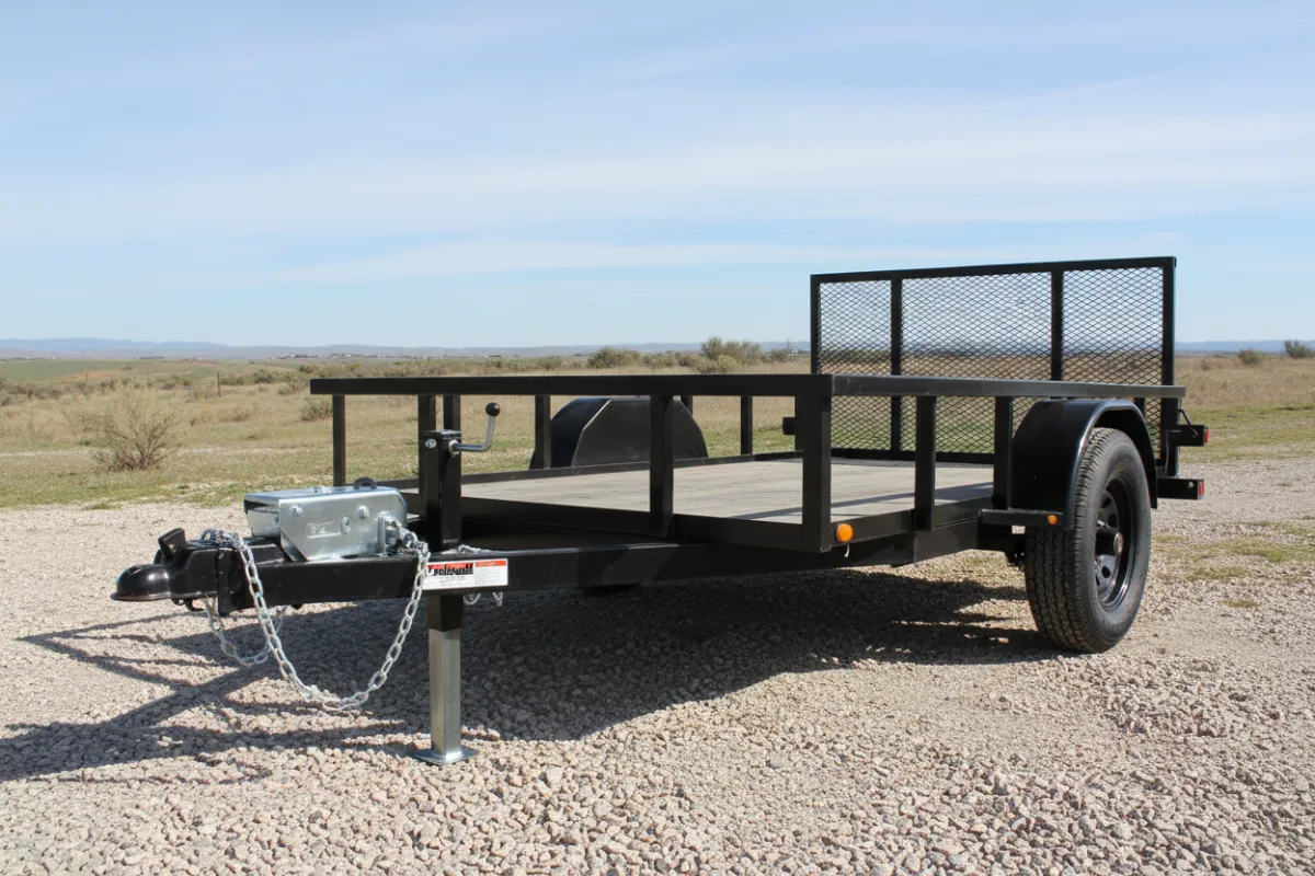 TrailHaul 12' utility trailer on gravel, three-quarter angle
