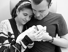 Jarrett and Luisa holding baby Matthew for the last time in this life