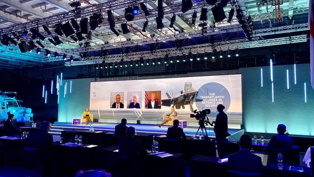 13:52Claude responded: A Sheldon Social client speaking at a large-scale conference on the Transatlantic Alliance in Aviation, on a dramatic stage with a large screen backdrop and pr…A Sheldon Social client speaking at a large-scale conference on the Transatlantic Alliance in Aviation, on a dramatic stage with a large screen backdrop and professional lighting — an example of thought leadership and brand visibility work supported by Sheldon Social's strategic content approach.