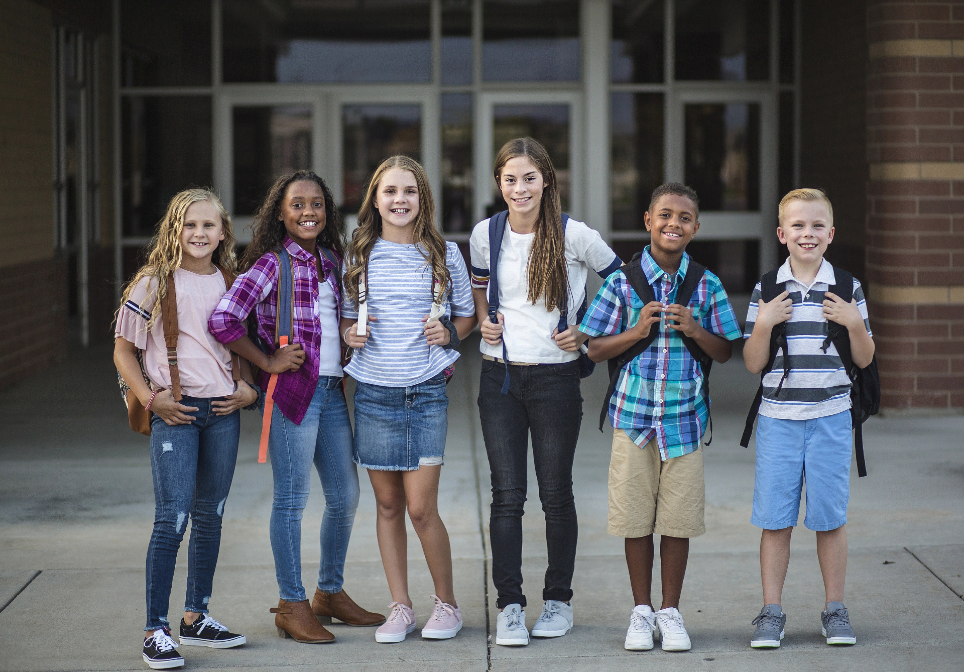 Middle school students with backpacks