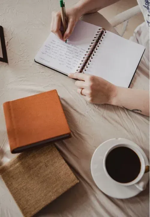 Notebooks and coffee