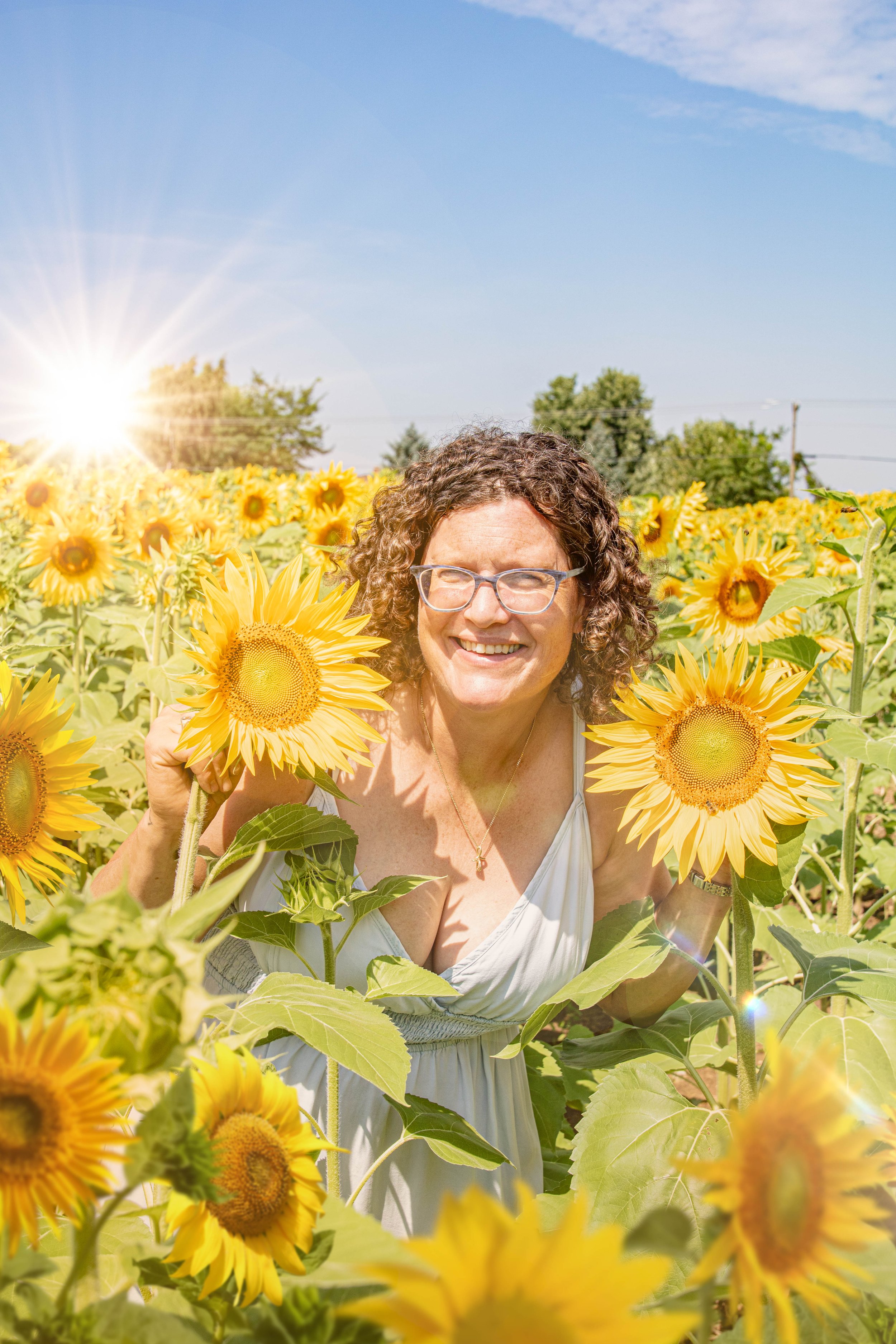 Woman in sunflower field