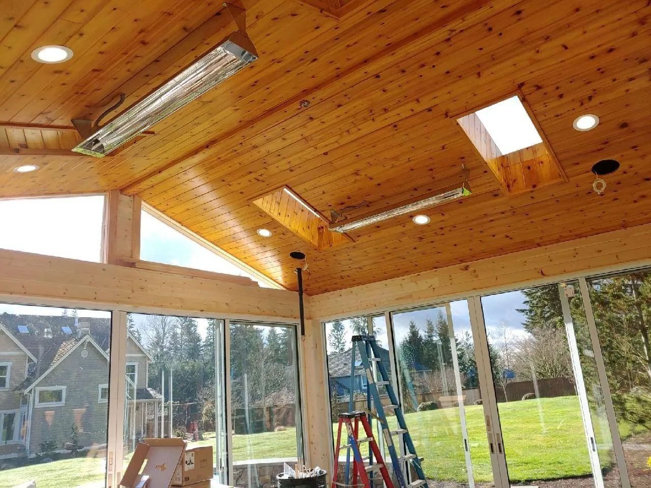 Sunroom heaters and skylights