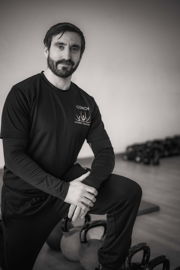 Coach sitting in gym