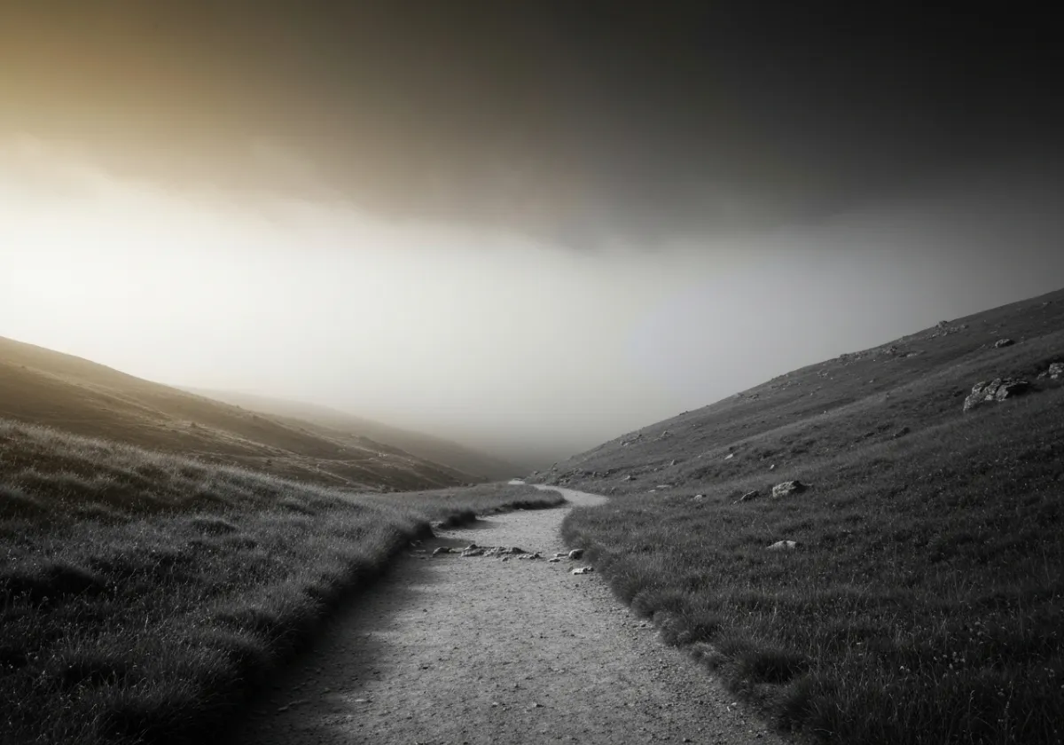 A quiet mountain path shrouded in mist representing a clear way forward