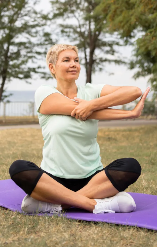 Woman doing yoga outdoors