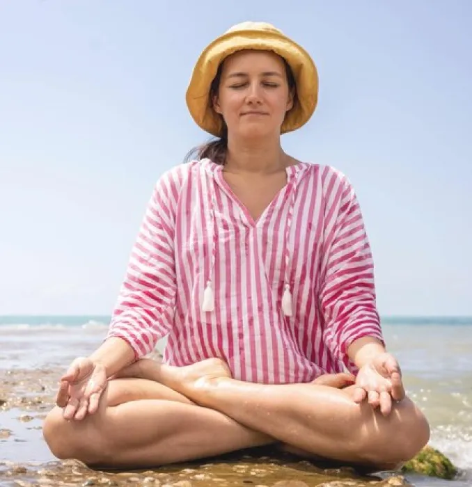 Woman meditating cross-legged