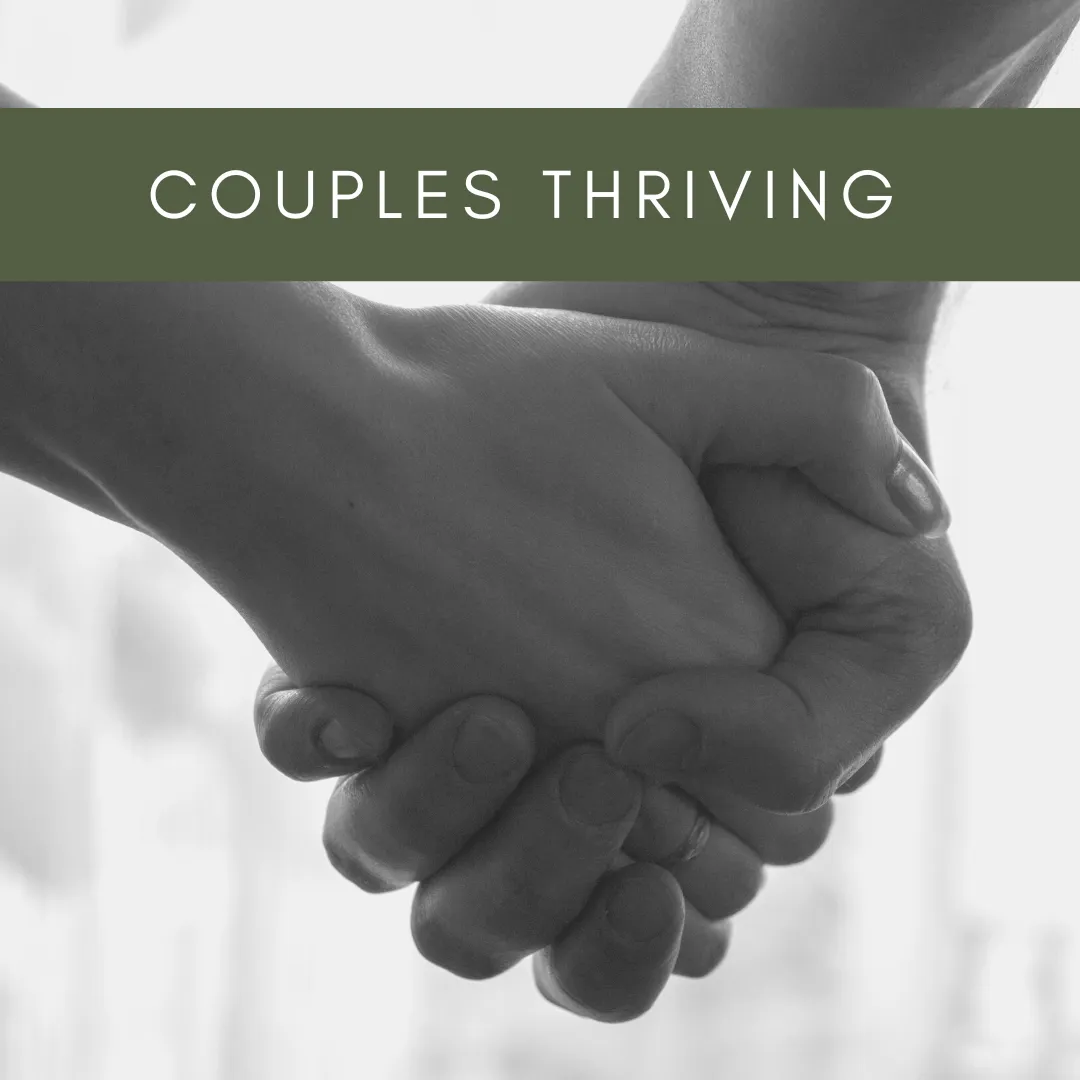Close-up of two people holding hands with a banner that reads Couples Thriving.