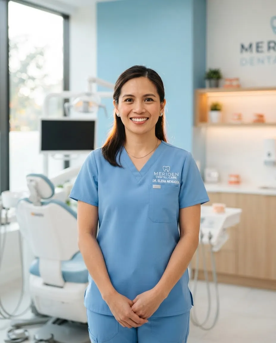 Dr. Ana Reyes offering a welcoming smile inside her modern, gentle dental practice