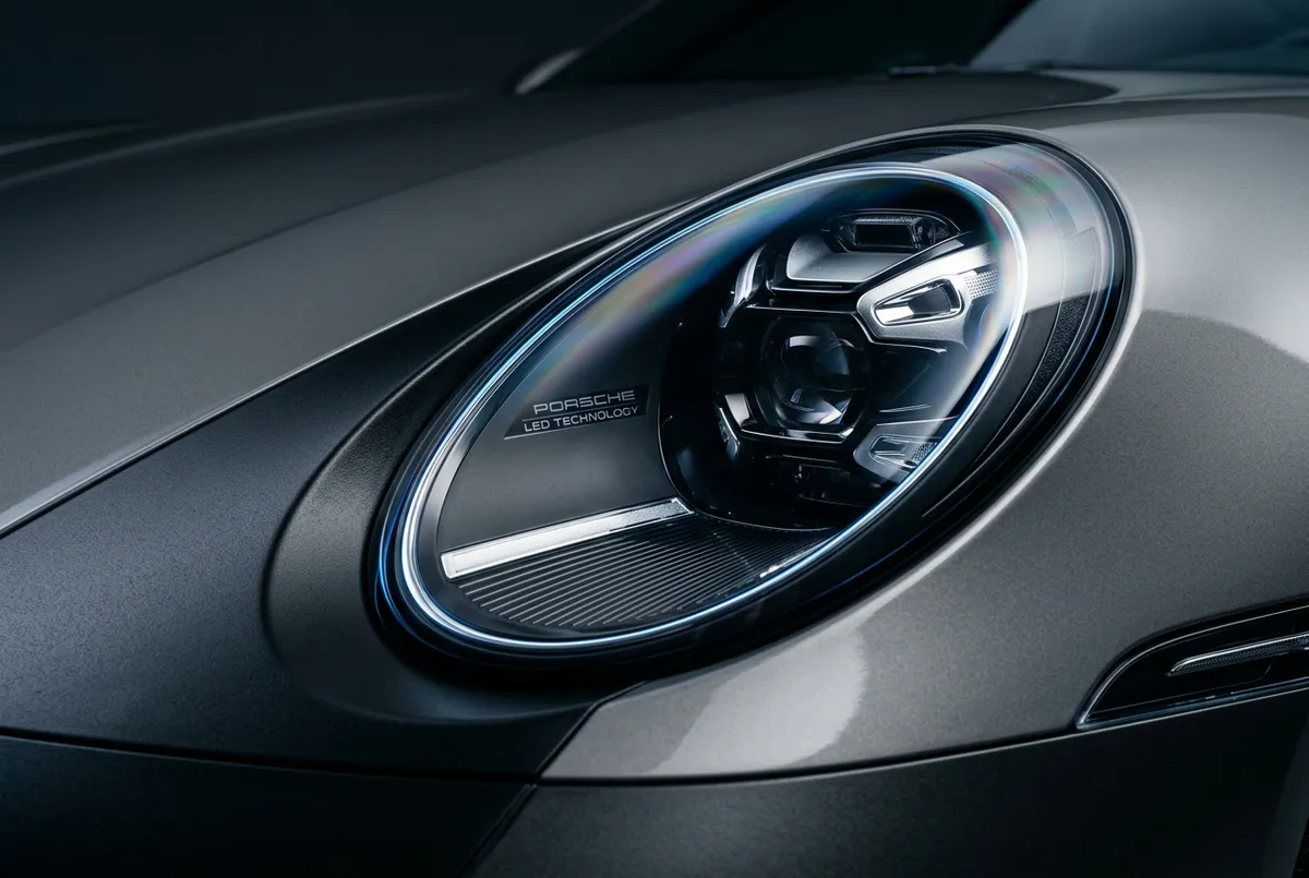 Restored clear polycarbonate headlights and conditioned automotive trim