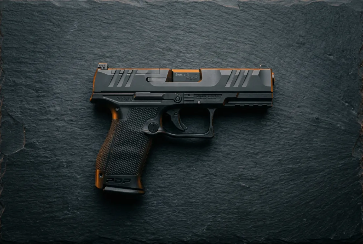 Tactical 9mm Compact Handgun on Matte Surface
