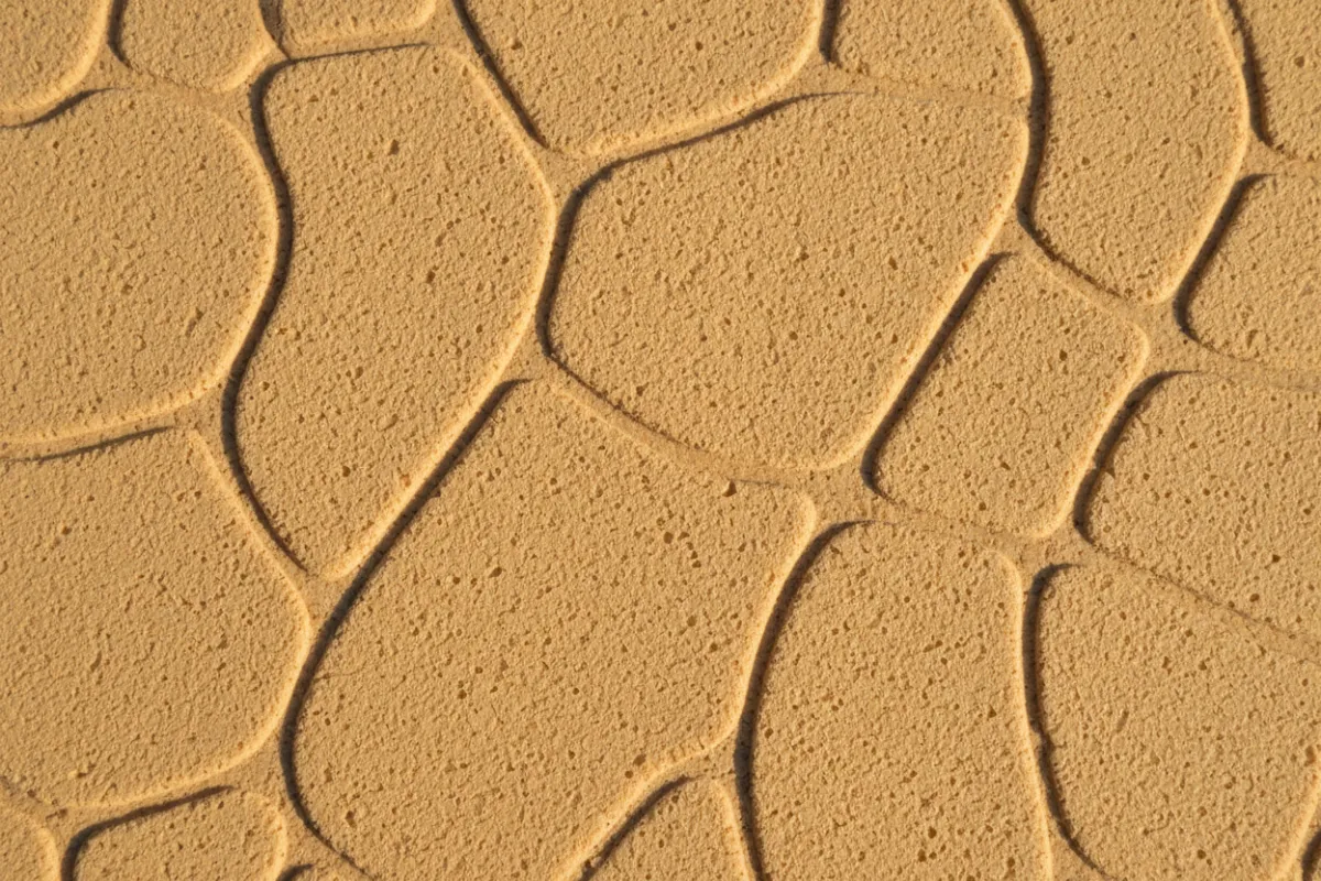 Close-up texture of OceanGrip EVA foam pattern showing foam cell detail and subtle grip pattern.