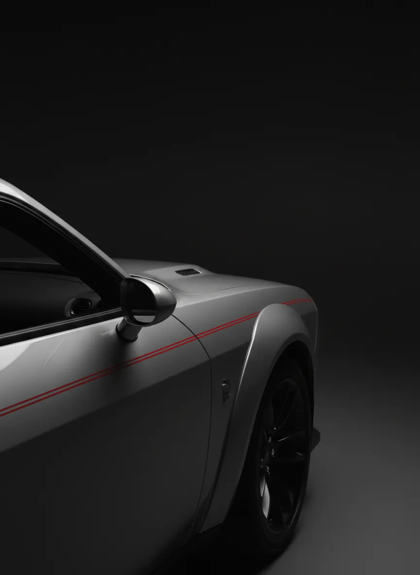 Desaturated, high-contrast tight crop of Dodge vehicle body lines